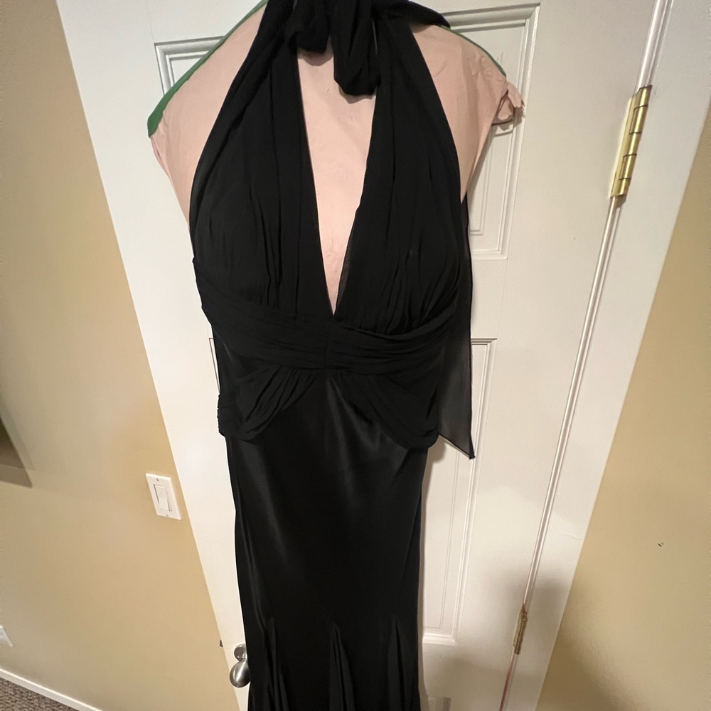 This is a Dina Bar-El open back stunning halter style gown size M